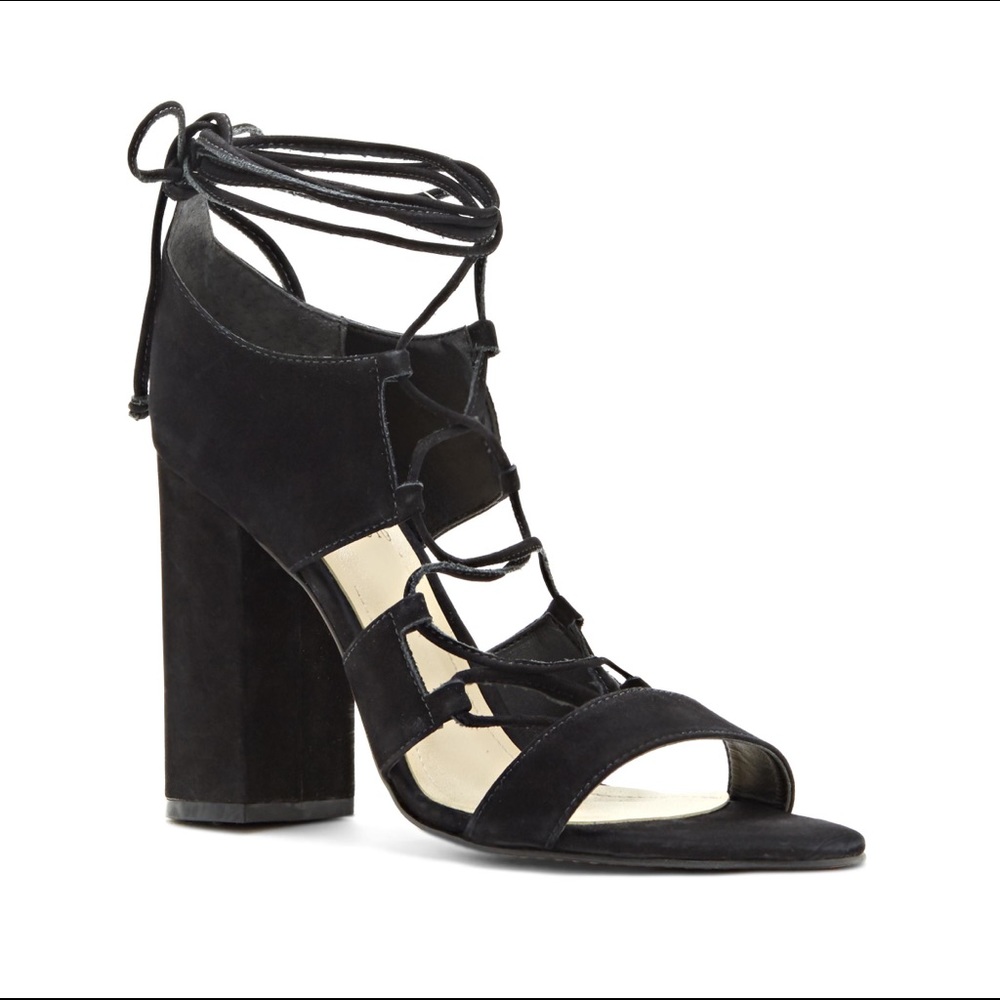 Vince Camuto lace up block sandals.